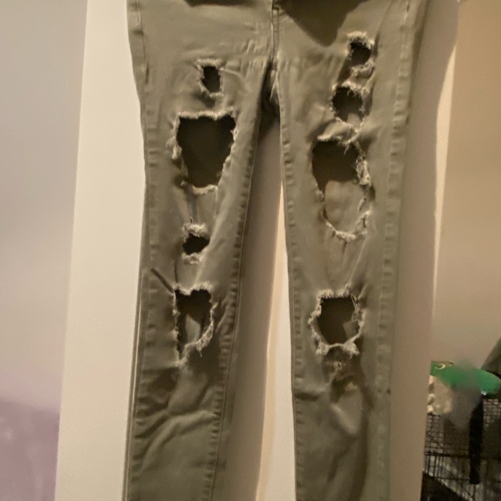Green ripped jeans